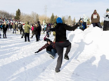 Participants attempt to break the world record for the world's largest snowball fight on Sunday, Jan. 31, 2016.