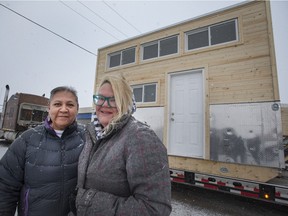 Idle No More's Raven Sinclair and Mini Homes of Manitoba's Anita Munn with a mini home en route to Big River First Nation.