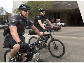 Constables Eric Flogan and Vince Gabruch, left, part of the Saskatoon City Police Bike Patrol, ride along 4th Avenue for another day on the job, May 15, 2012 in this Saskatoon StarPhoenix file photo. Now, Ward 2 Coun. Pat Lorje is calling for an increased bike patrol presence in Pleasant Hill.
