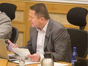 Darren Hill is seen though chairs at City Council on Monday, September 21st, 2015.