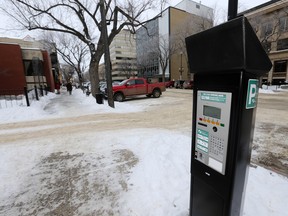 A report heading to council's planning committee on Monday recommends the city's panhandling bylaw be changed to forbid panhandling at parking pay stations while people are using them.