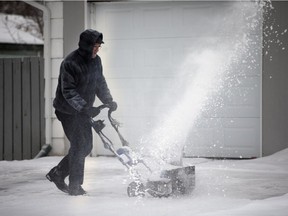 Snow returned to Saskatoon, Wednesday, January 06, 2016 and meant for numerous crashes and shovelling. Barry Rudd cleans up the snow at his west side home.