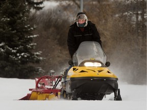 A track groomer prepares the runs for cross country skiers in Kinsmen Park,  Monday, January 11, 2016.