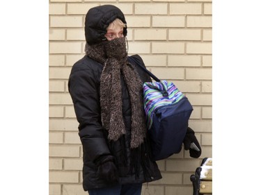 Pedestrians in Saskatoon were bundled up for the extreme wind chill in the city,  Monday, January 18, 2016.