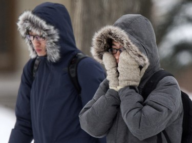 Pedestrians in Saskatoon were bundled up for the extreme wind chill and snow in the city,  Monday, January 18, 2016.