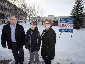 Cosmo Industries Board Chair Brent Rempel, program participant Steven Kinakin and Sharlene Duquette at one of two of Cosmo's new satellite locations, this one on Arlington Avenue, Friday, January 22, 2016.