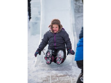 Abbigail Davidson slides down the ice slide at the PotashCorp Wintershines Festival in Saskatoon, January 23, 2016.