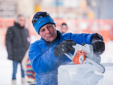 Doug Lingelbach uses a chainsaw to carve ice sculptures at the PotashCorp Wintershines Festival in Saskatoon, January 23, 2016.