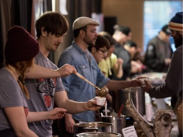 Guests try soups from a variety of Chefs at the Warm The Heart Novice Chef Soup Cook-Off in the Saskatoon Farmers' Market at the PotashCorp Wintershines Festival, January 24, 2016.