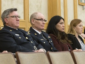 Saskatoon Police Service Deputy Chief Bernie Pannell, left, and Chief Clive Weighill attend City Council budget debates at City Hall on November 30, 2015 with Board of Police Commissioner members, Carolanne Inglis-McQuay and Darlene Brander.