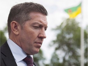 Sheldon Kennedy looks on outside the Court of Queen's Bench after the trial of Graham James in Swift Current, Saskatchewan, on June 19, 2015. Former NHL hockey player Kennedy, who was sexually abused by his junior hockey coach while playing in Swift Current, Sask., says he accepts an apology from the city.