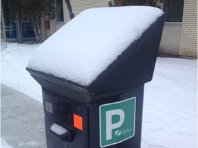 Snow on one of Saskatoon's new solar-powered pay parking stations on Monday January 18, 2016.