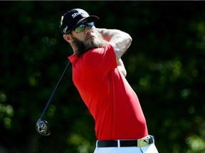 Graham DeLaet of Canada plays his shot from the first tee during the final round of the Sony Open In Hawaii at Waialae Country Club on Jan. 17.