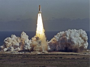 FILE - In this Jan. 28, 1986 picture, the space shuttle Challenger lifts off from the Kennedy Space Center in Cape Canaveral, Fla. shortly before it exploded with a crew of seven aboard.