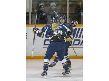 The University of Lethbridge Pronghorns celebrate a goal against the the University of Saskatchewan Huskies in CIS women's hockey action at Rutherford Rink, January 9, 2016.