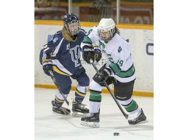 University of Saskatchewan Huskies forward Rachel Johnson moves the puck against the University of Lethbridge Pronghorns in CIS women's hockey action at Rutherford Rink, January 9, 2016.