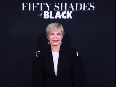 Florence Henderson poses upon arrival for the premiere of "Fifty Shades of Black" in Los Angeles, California, January 26, 2016.