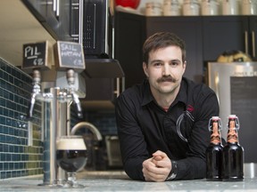 Greg Paterson, an award-winning home brewer, in the kitchen of his home, where his beers are on tap.