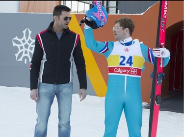 Taron Egerton (R) and Hugh Jackman star in "Eddie the Eagle."