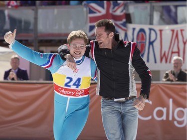 Taron Egerton (L) and Hugh Jackman star in "Eddie the Eagle."