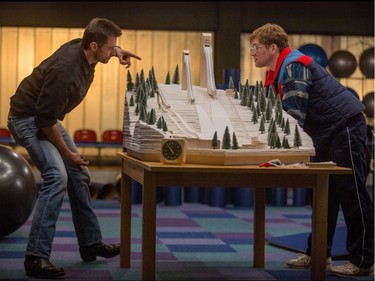 Taron Egerton (R) and Hugh Jackman star in "Eddie the Eagle."