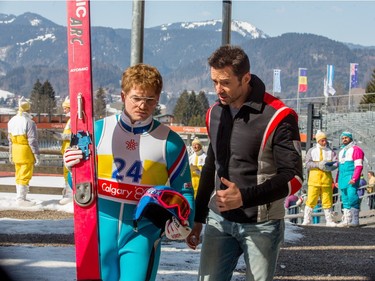 Taron Egerton (L) and Hugh Jackman star in "Eddie the Eagle."