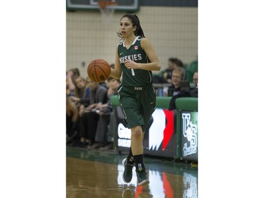 University of Saskatchewan Huskies guard Desarae Hogberg moves the ball against the University of Brandon Bobcats in CIS Women's Basketball action, February 6, 2016.