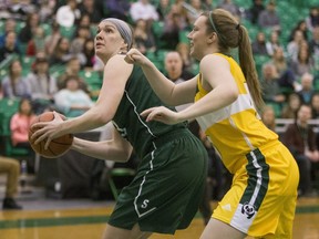 University of Saskatchewan Huskies forward Dalyce Emmerson attempts to take a shot against the University of Alberta Pandas in CIS Women's Basketball action, Feb. 13, 2016.