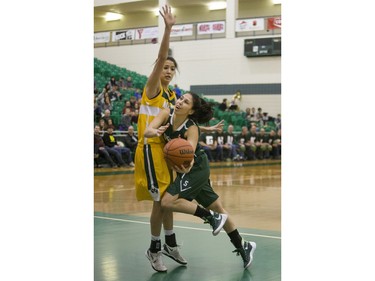 University of Saskatchewan Huskies guard Desarae Hogberg pushes thsough a lay up against the University of Alberta Pandas in CIS Women's Basketball action, February 13, 2016.