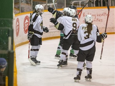 The University of Manitoba Bisons celebrate a goal against the University of Saskatchewan Huskies in CIS Women's Hockey action on Saturday, February 20th, 2016.