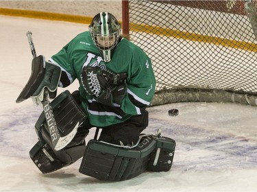 University of Saskatchewan Huskies goalie Cassidy Hendricks makes a save against the University of Manitoba Bisons in CIS Women's Hockey action on Saturday, February 20th, 2016.