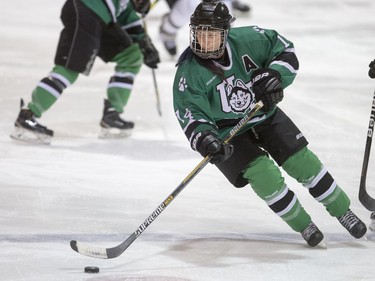 University of Saskatchewan Huskies defence Julia Flinton moves the puck against the University of Manitoba Bisons in CIS Women's Hockey action on Saturday, February 20th, 2016.