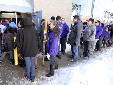 Community members take part in the Reclaiming Our School walk in La Loche  on February 24, 2016.