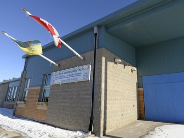 The sealed front doors to the La Loche Community School in La Loche on February 24, 2016.