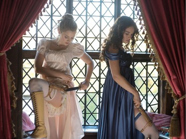 Bella Heathcote (L) and Lily James star in "Pride and Prejudice and Zombies," an Entertainment One release.
