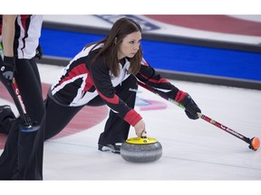 Ontario skip Jenn Hanna makes a shot during the 12th draw against Newfoundland and Labrador at the Scotties Tournament of Hearts in Grande Prairie, Alta. Wednesday, Feb. 24, 2016.