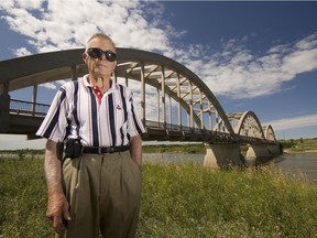 Orville Middleton stands in front of the Borden Bridge near Highway 6 west of Saskatoon.