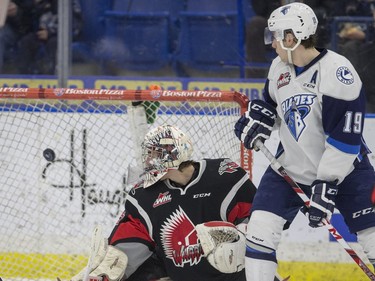 Saskatoon Blades Ryan Graham looks on a the puck gets past Moose Jaw Warriors goalie Brody Willms in WHL action on Sunday, February 28th, 2016.