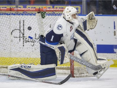 Saskatoon Blades goalie Evan Smith lets the puck past him as the Moose Jaw Warriors score in WHL action on Sunday, February 28th, 2016.
