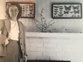 Muriel Guiguet, Laurent's daughter-in-law. On her wall are two of the cases of insects that Laurent collected.