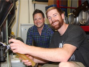 Founders of 9 Mile Legacy Brewing, Shawn Moen and Garrett Pederson, at the 9 Mile brewhouse, where the craft brewery creates and perfects its beers on Sunday afternoon.