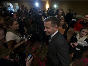 Saskatchewan NDP leader Cam Broten speaks to reporters following a speech to NDP candidates from across the province gathered at the Radisson Hotel Saturday.