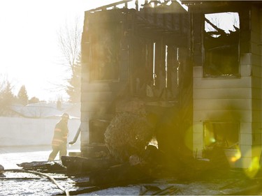 Saskatoon firefighters on the scene of a house fire at 367 Coppermine crescent on Sunday, February 7th, 2016.