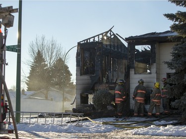 Saskatoon firefighters on the scene of a house fire at 367 Coppermine crescent on Sunday, February 7th, 2016.