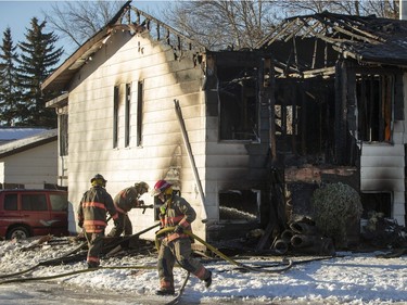 Saskatoon firefighters on the scene of a house fire at 367 Coppermine crescent on Sunday, February 7th, 2016.