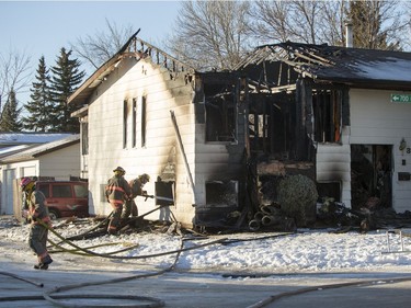 Saskatoon firefighters on the scene of a house fire on Coppermine Crescent, February 7, 2016.