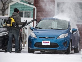 A light dusting of snow in Saskatoon was enough to bring out the snow blowers, February 1, 2016