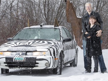 Mark and Moira Willems pose for a photograph with their zebra car on  February 13, 2016.