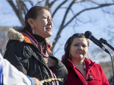 Lori Nicotine, left, speaks as Nicole Yamchuk looks on at city hall prior to going on a walk for missing and murdered indigenous women on Sunday, February 14th, 2016.