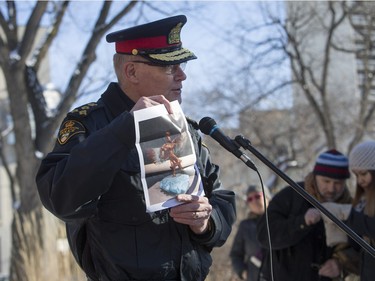 Saskatoon police chief Clive Weighill speaks and shows a images of a future memorial looks on at city hall prior to going on a walk for missing and murdered indigenous women, February 14, 2016.